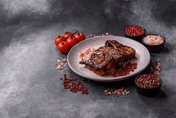 Grilled or bbq pork ribs with sauce, a food prepared for dinner. Grilled ribs