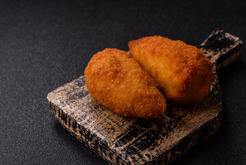 Chicken Kyiv cutlet with buttery filling, a lunch of chicken breast meat. Chicken Kyiv cutlet