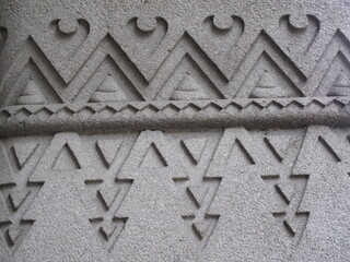 Architectural Texture Series – 01: Historic stone column with geometric carved pattern, detailed ornamental facade element