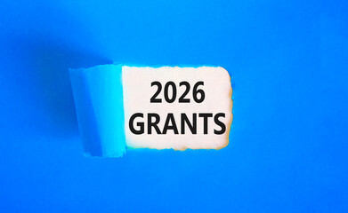 2026 Grants symbol. Concept words 2026 Grants on beautiful white paper. Beautiful blue paper background. Business and 2026 grants concept. Copy space.