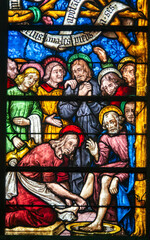 Obraz premium Stained glass (16th century) of Jesus Christ washing the Feet of the Apostles.