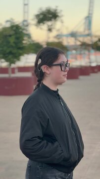 cochlear implant, teenager, rehabilitation, inclusion, technology, hearing, accessibility young woman in sunglasses