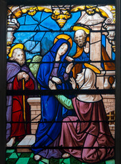 Fototapeta premium Stained glass (19th century) of Visitation of the Virgin Mary to her pregnant cousin Elizabeth.