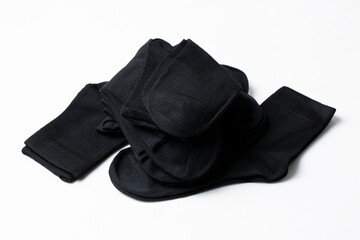 Black socks on a white background Casual clothing.