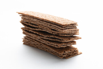 Dry rye crispbreads on a white background