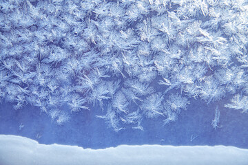 Pattern of frost on the window pane. Beauty of nature. Frost texture.