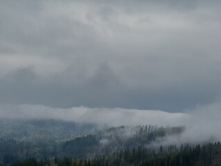 Misty Autumn Rain Clouds over Ukrainian Carpathian Mountains.