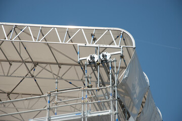 Scaffolding on the roof of a construction site to protect workers from the sun's rays and heat, Rome, Italy.