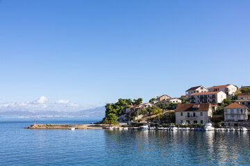 Coastal Village By The Sea With Boats, Whitewashed Houses, Sunny Harbor, And Blue Horizon, Stomorska, Croatia