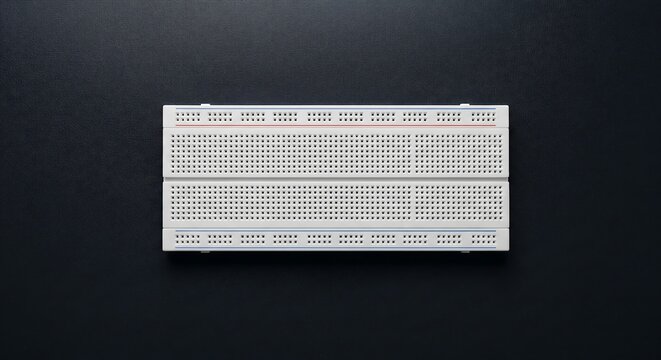 Electronics prototyping on a breadboard for innovative engineering projects and educational experiments, fostering creativity with circuit design and testing