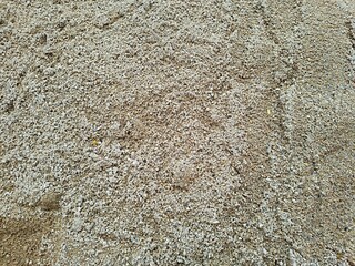 Texture of river sand commonly used for construction when mixed with cement