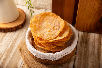 Buñuelos de rodilla. Traditional food at Christmas and winter holidays in Mexico, these are fried dough flour sprinkled with sugar or covered in a syrup made with piloncillo, cinnamon, and guava.