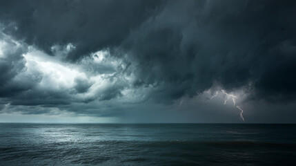 Fototapeta premium Stormy sea under dramatic gray skies lightning on the horizon.