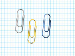 paper clips on notebook sheet background