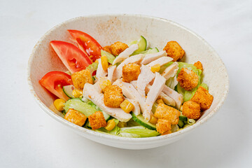 Crisp lettuce, tender chicken, and bright vegetables combine for a healthy meal that delights