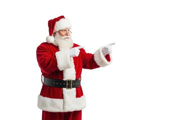 Santa claus pointing to the side with his finger while standing isolated on transparent background