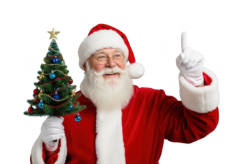 Happy santa claus holding a small decorated christmas tree and pointing upward with his index finger, isolated on transparent background