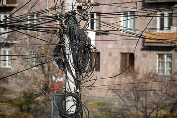 A pole with many wires on it