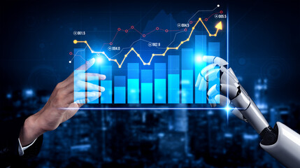 A human hand and a robotic hand interact with a transparent digital interface displaying financial graphs and data trends in a futuristic business environment. Scalp