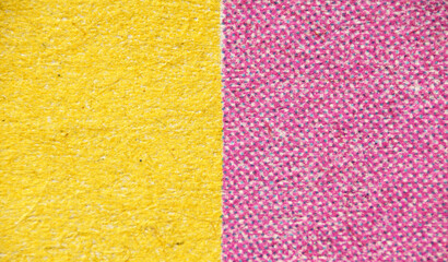 Close-Up of Colorful Textured Fabric Split in Yellow and Pink