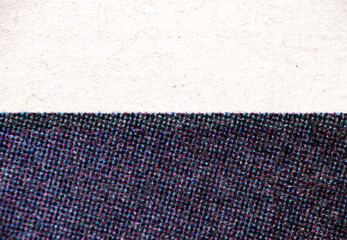 Dark CMYK Halftone Strip on Textured Off-White Paper