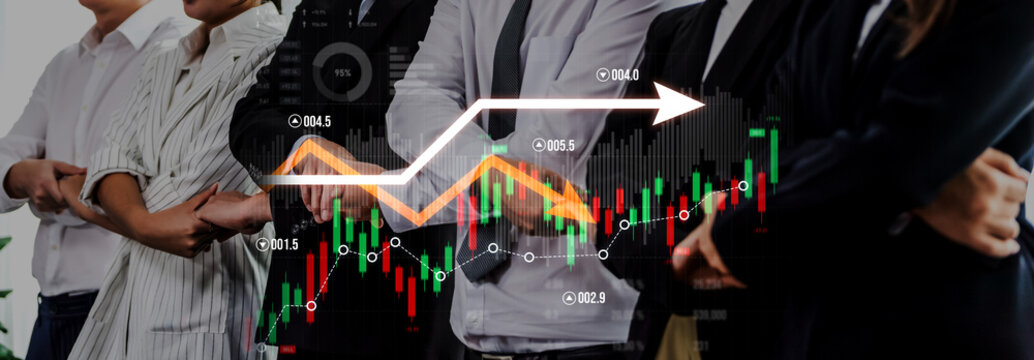 A diverse business team showcases a focus on financial growth through a stock market chart, symbolizing teamwork and strategic planning for success in finance. Scalp