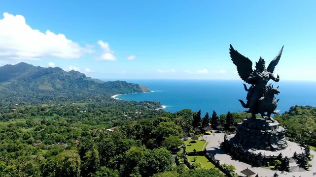 Coastal view of Garuda Wisnu statue against clear sky, Bali