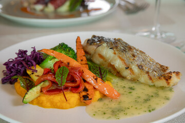 fresh catch of the day with steamed vegetables