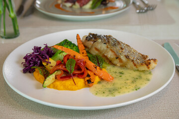 fresh catch of the day with steamed vegetables