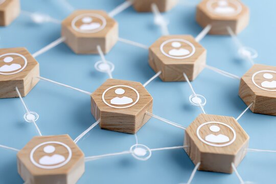 Network Diagram of Wooden Blocks with User Icons on Light Blue Background - Powered by Adobe