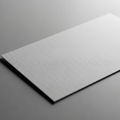 Textured Gray Paper with Subtle Shadows Creating a Minimalist Background