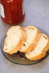 Butter and cranberry red jam on a table