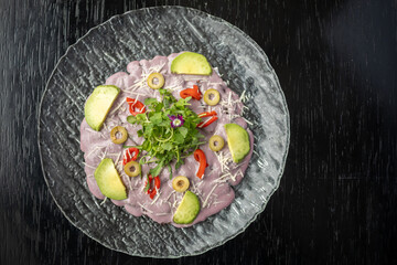 traditional Peruvian food, octopus carpaccio