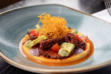 traditional Peruvian food, octopus anticuchero