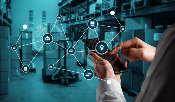 Smart warehouse management system with innovative internet of things technology to identify package picking and delivery . Future concept of supply chain and logistic network business .