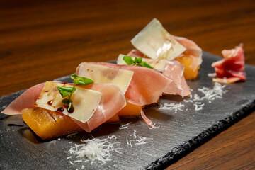 Traditional Peruvian food, prosciutto with melon