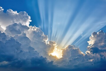 Dramatic Sunlight Beaming Through Cumulus Clouds Creating Stunning Rays in Blue Sky