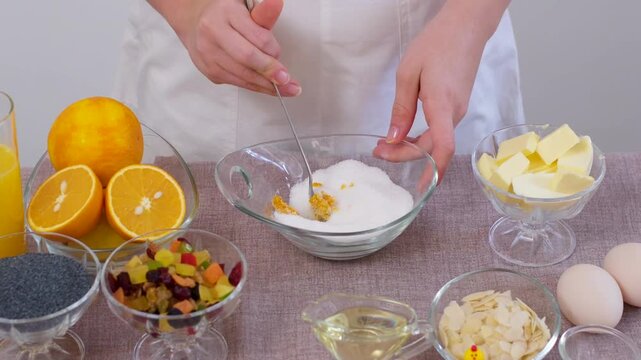 baking for Christmas Easter Making homemade cruffin step by step, rolling yeast dough, spreading butter and poppy seeds, adding dried fruits, baking layered cruffins, cooking process in the kitchen
