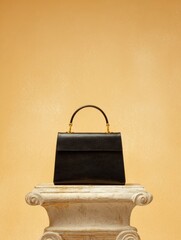 Black luxury handbag on stone pedestal with warm gold background, premium holiday visuals for branding, marketing, and digital design