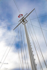 Iconic flag mast on Halifax Citadel, symbolizing maritime heritage against a dramatic sky.

