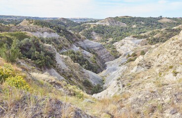 The Caprock Coulee Trail at Theodore Roosevelt National Park is known for its colorful badlands
