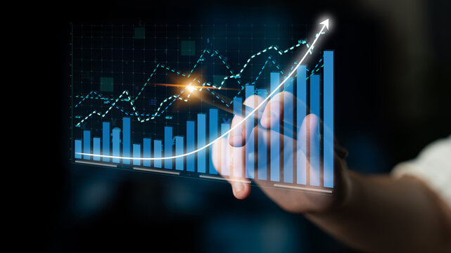 A hand interacts with a digital graph, showcasing a rising trend in data visualization. This image represents growth and success in business analysis and decision-making. Impute - Powered by Adobe