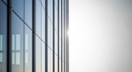 Urban geometry: Minimalist glass facade with sunlight reflection design