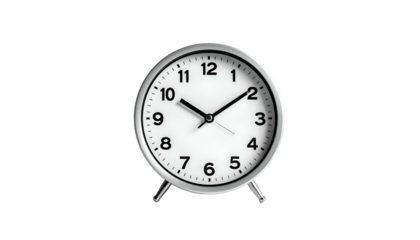 Simple silver alarm clock showing ten past ten
