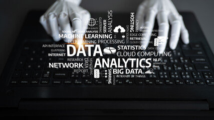A close-up view of hands typing on a keyboard with various data analytics keywords surrounding it. This image symbolizes the intersection of technology and data-driven insights. Tessel