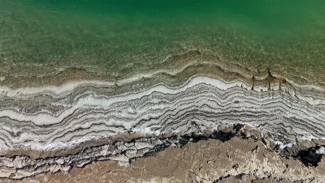 Salt Crystals beach Dead Sea Shore, Aerial view
DRONE VIEW of salt formations at the Dead Sea, sunrise colors, filmed in Israel, 2025
