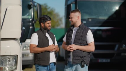 Multinational truck drivers shaking hands after a deal
