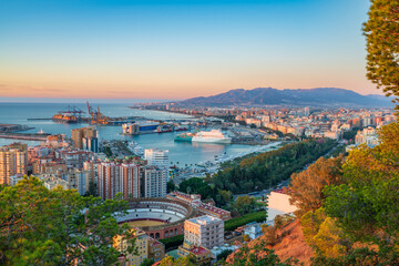 Plaza del toros and port of Malaga at sunrise. Spain