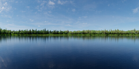 Serene Lake With Forest Shore Under Clear Blue Sky Reflections and Tranquil Water
