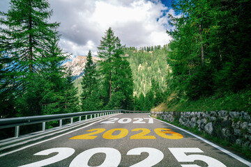 2026 New Year road trip travel and future vision concept . Nature landscape with highway road...